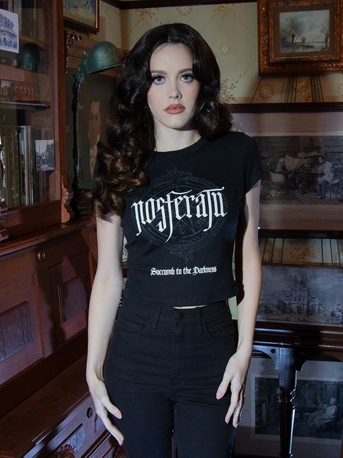 A tribute to vintage horror, this Nosferatu Baby Doll Tee showcases Count Orlock's sigil on soft, breathable black cotton, perfect for haunting day or night.

