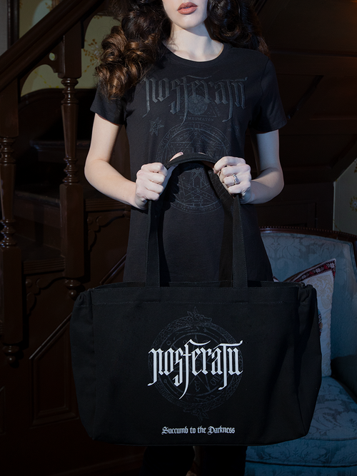 Carry your secrets in the Count Orlock Sigil Tote Bag in Black. Crafted from durable canvas, its dark sigil design evokes eldritch mystery, making it perfect for moonlit errands or shadowy strolls. Sturdy straps ensure comfort as you embrace gothic sophistication.