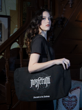 The Count Orlock Sigil Tote Bag in Black features an arcane emblem that whispers of forbidden lore. With ample space and reinforced handles, it’s both practical and mystically captivating for everyday gothic use.