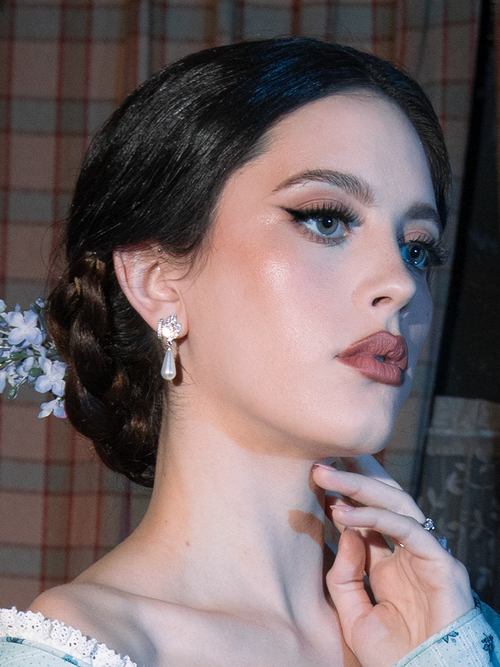 Adorn yourself with timeless grace. These earrings feature shimmering rhinestones cascading into elegant pearl drops, exuding gothic opulence. Perfect for candlelit galas or moonlit promenades, their lightweight design ensures effortless wear.