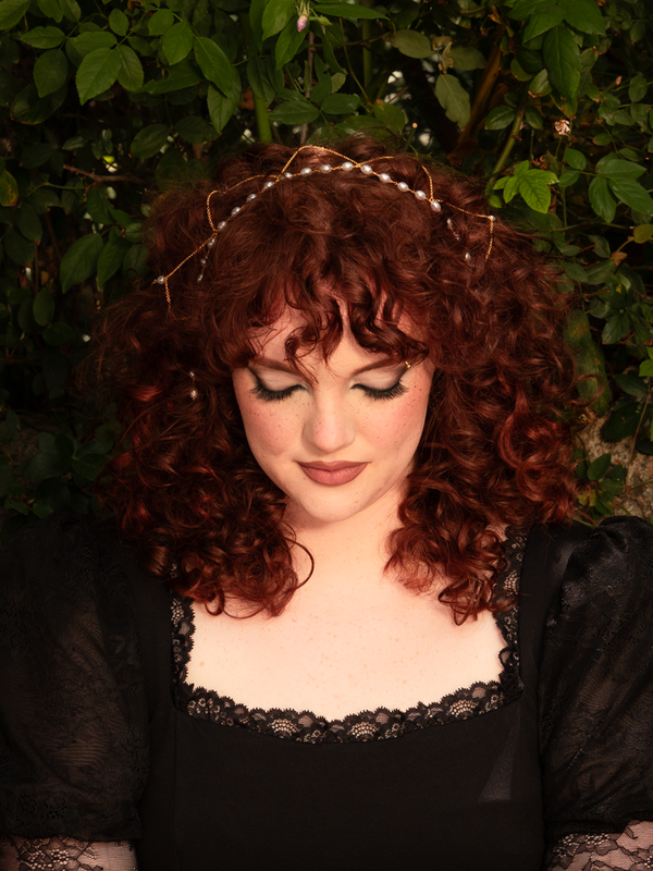 Pearls glow like starlight among cascading gold tassels, transforming the hair into a statement of dark romance. Easy to style for evening wear; keep away from perfumes.