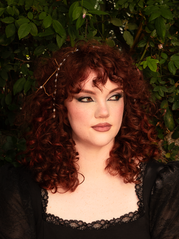Warm gold chains and soft pearls cascade like candlelit whispers, draping the hair in decadent splendor. Lightweight and fluid, crafted for graceful wear; store flat to preserve shape.