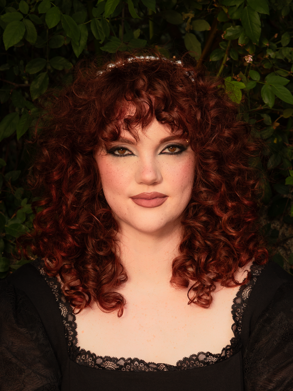 An adornment of celestial beauty, silver strands and pearls flow in perfect harmony, draping the hair with timeless allure. Crafted for special evenings; store flat to protect its form.