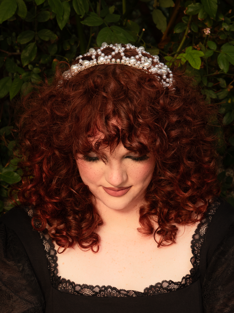 Delicate yet dramatic, this silver headband releases pearls in a soft waterfall, moving with every turn of the head. Comfortable fit, refined detailing; avoid moisture and perfumes.
