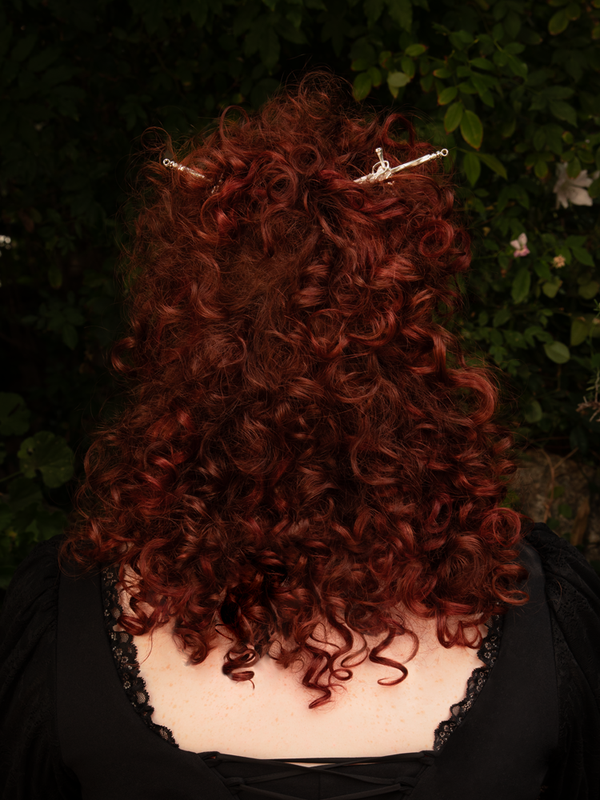 Perfect for moonlit gatherings or mysterious soirées, the Sword Hair Pin in Silver blends delicate strength with gothic allure, securing your locks in shimmering rebellion.