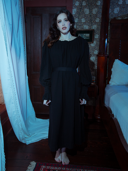 Surrender to timeless beauty in the Victorian Sleeping Dress in Black, featuring flowing sleeves and gothic-inspired lace for dreamy sophistication.