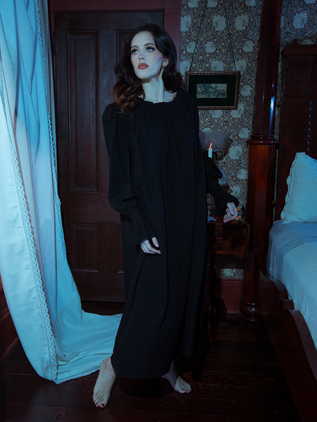 Graceful as a shadow, the black Victorian sleeping dress merges comfort and style with a flattering fit and dreamy, gothic-inspired details.