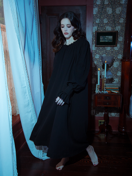 Hauntingly beautiful, the Victorian Sleeping Dress in Black pairs its luxurious fabric with intricate ruching and a whisper of lace at the collar.