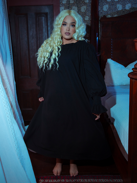 Envelop yourself in nocturnal elegance with the Victorian Sleeping Dress in Black, crafted from soft satin. Lace accents and flowing sleeves evoke vintage allure.