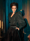 Featuring gothically gorgeous female models, the Taffeta Edwardian Blouse in Black is brought to life through an array of poses.