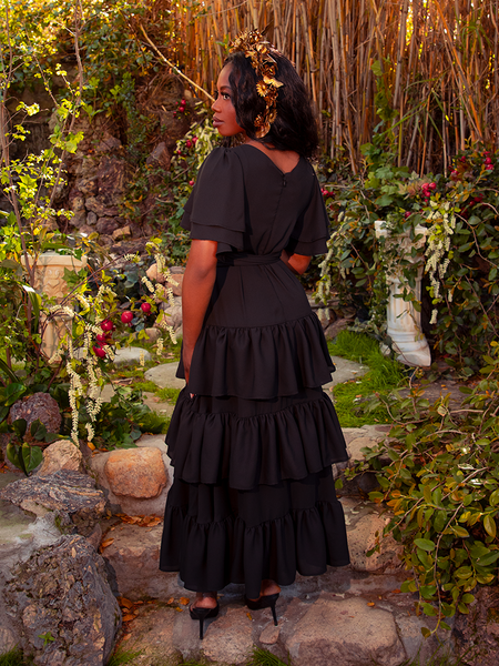 Step into the realm of the night with the Underworld Dress in Black. This enchanting dress, with its rich black hue, drapes you in gothic splendor. Perfect for moonlit gatherings or intimate evenings, it transforms every moment into a dance of shadows.