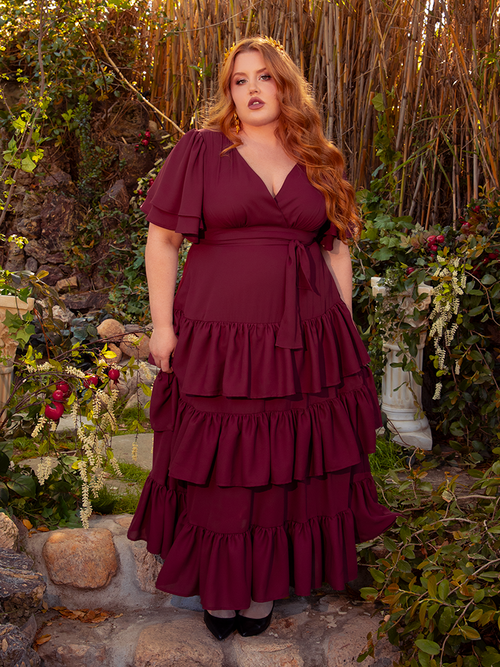 The Underworld Dress in Wine Red is a masterpiece of gothic romance. Its rich, flowing fabric drapes you in the essence of dark elegance, making it ideal for candlelit dinners or shadowy garden strolls. Every movement in this dress is a dance with the night.