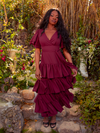 The Underworld Dress in Wine Red is a symphony of gothic elegance. Crafted from rich, flowing fabric, it drapes you in a seductive wine-red hue, ideal for twilight events or nocturnal adventures. This dress is your key to a world of dark enchantment.