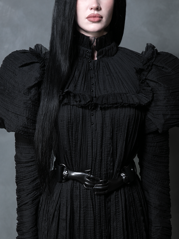 A female model channels ultimate gothic glamour while wearing a dramatic, romantic black Victorian dress that evokes timeless mystery.