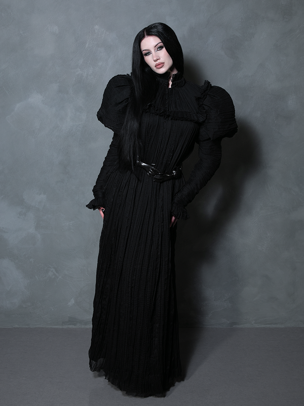 Romantic goth fashion: a close-up of the Victorian Hands Belt in Black cinching a flowing velvet dress.
