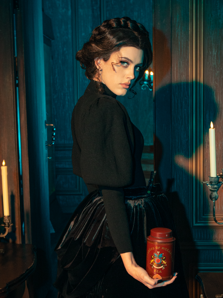 Modeling the Victorian Cycling Pullover Sweater in Black, gothically gorgeous female models captivate with their diverse poses.