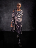 The Alien™ Xenomorph Trapeze Dress being worn by Braxton Holmes while he walks towards the camera.