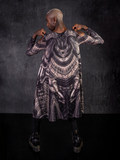 Braxton Holmes showing off the back of the Alien™ Xenomorph Trapeze Dress.