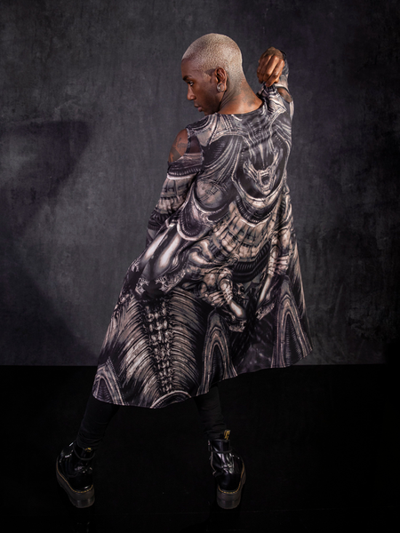 A backshot of the Alien™ Xenomorph Trapeze Dress being worn by Braxton Holmes.