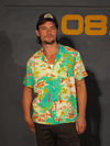 Male model wearing the ALIEN Space Souvenir Button Up Shirt paired with green combat pants.
