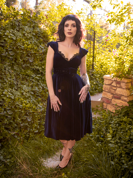 The Baudelaire Swing Dress in Midnight Blue modeled by Stephanie from gothic clothing company La Femme en Noir.