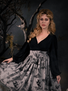 Linda in a gothic style outfit including the Bishop Blouse in Black and grey Sleepy Hollow skirt.