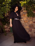 Ashley models the gothic fashion brand La Femme en Noir's Odyssey Maxi Dress in Black.