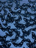 Close up of the fabric and print on the goth glamour Tim Burton's CORPSE BRIDE™ Butterfly Babydoll Dress in Dusk Blue.