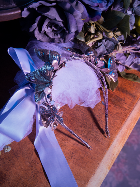 An isolated shot of the Tim Burton's CORPSE BRIDE™ Emily Butterfly Headband.