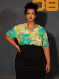 Model wearing the ALIEN Space Souvenir Button Up Shirt tucked into a black pencil skirt.
