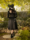 A backshot of Stephanie in the latest goth style dress from La Femme en Noir - the Cottage Witch Dress in Japanese Black Satin.