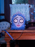 The Tim Burton's CORPSE BRIDE™ Emily Bag photographed next to a butterfly positioned underneath a glass lid.