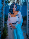 Portrait shot of model wearing Tim Burton's CORPSE BRIDE™ Emily Butterfly Gown in Celestial Blue from La Femme en Noir.