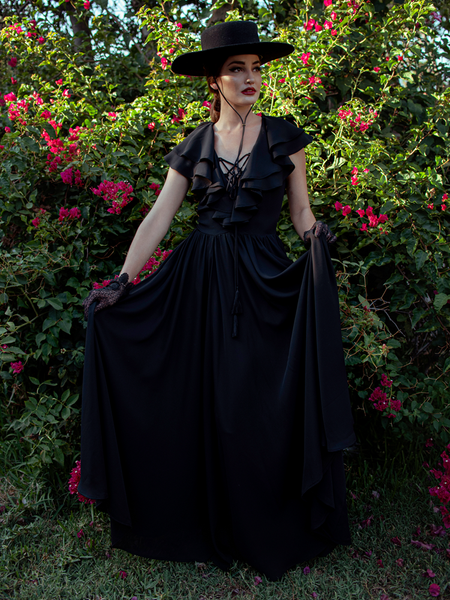 Aliza wearing the Mythical Goddess Gown in Black - a gothic style dress from La Femme en Noir.