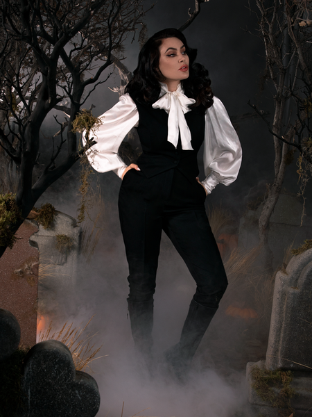Micheline Pitt tucking her hands into her pockets showing off the Sleepy Hollow Ichabod Pants in Black.