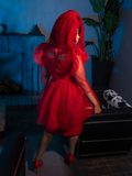 The back of the BEETLEJUICE™ Lydia Dress as worn by female model from La Femme en Noir.