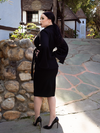 Side shot of Rachel Sedory wearing the Metropolis Suit Jacket in Black.