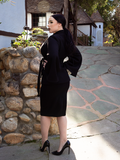 Side shot of Rachel Sedory wearing the Metropolis Suit Jacket in Black.