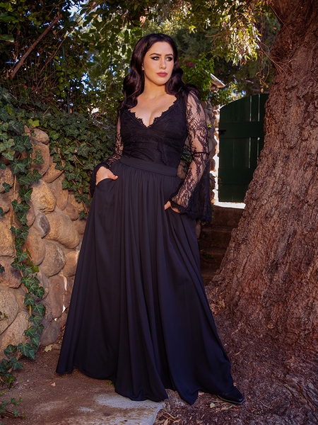 Ashley tucking her hands into the pockets of the Mythical Maxi Skirt in Black Chiffon.