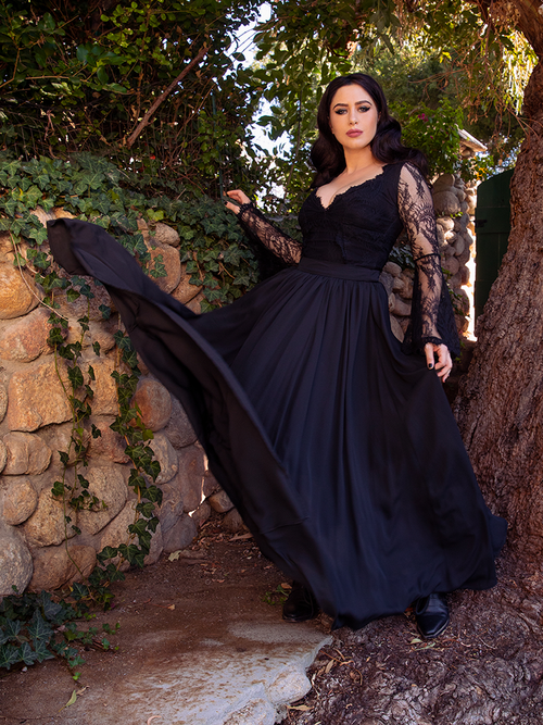Ashley tosses the skirt on the Mythical Maxi Skirt in Black Chiffon up and around on the Mythical Maxi Skirt in Black Chiffon in a wooded area.