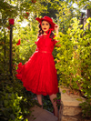 Ashley twirling around in the Mourning Dress in Crimson Lace From La Femme en Noir.