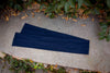 Product shot of the Art Deco Head Scarf in Navy Ponte.