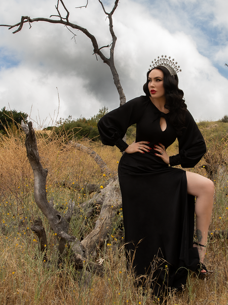 Micheline Pitt shows off the Opera Satin Gown in Black - a goth inspired glamourous gown from La Femme en Noir.