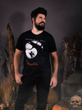 Male model looks off in the distance while modeling the Sleepy Hollow™ Heads Will Roll Tee with black jeans.