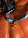 A detailed image of the Sleepy Hollow™ Katrina Star Pendant Necklace from La Femme En Noir.