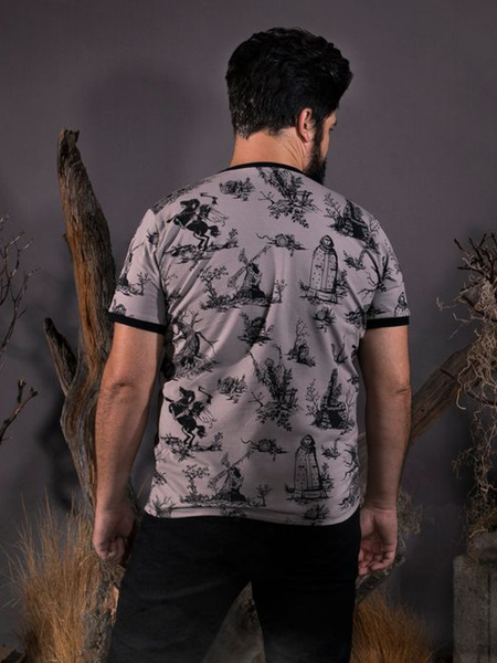 Facing away from the camera, R.H. Norman models the Sleepy Hollow™ Toile Ringer Tee from goth clothing brand La Femme En Noir.