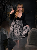 Linda in the Sleepy Hollow Gothic Tales Toile Skirt in Grey. 