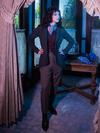 Stephanie wears the Tim Burton's CORPSE BRIDE™ Victor Peplum Blazer in Spruce Green along with other gothic retro clothing.
