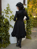 A shot of the back of the Victorian Dress in Black from goth style dress brand La Femme en Noir.