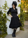 The Victorian Dress in Black comes with side pockets - the use of which demonstrated by La Femme en Noir model.
